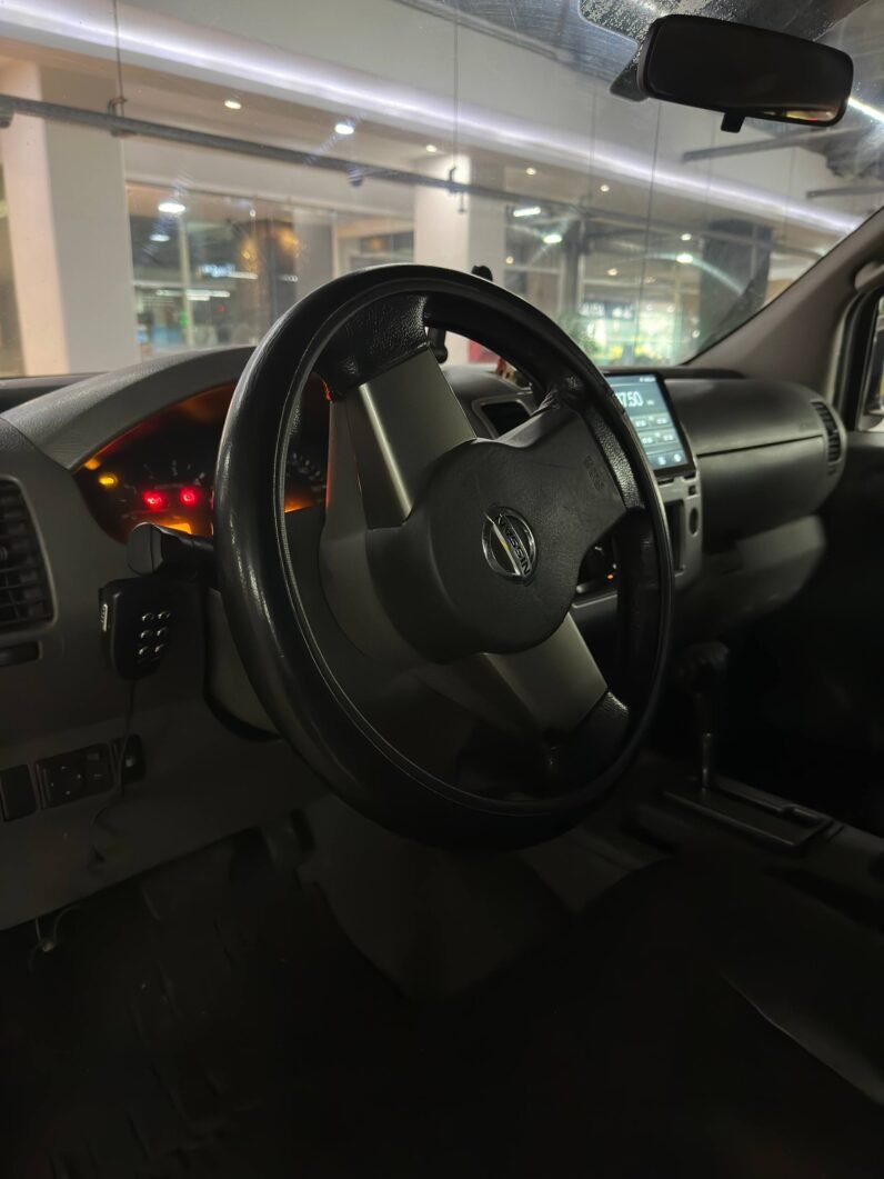 
								NISSAN NAVARA TURBO 4X4 2.5 AT full									