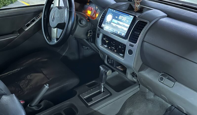 
								NISSAN NAVARA TURBO 4X4 2.5 AT full									