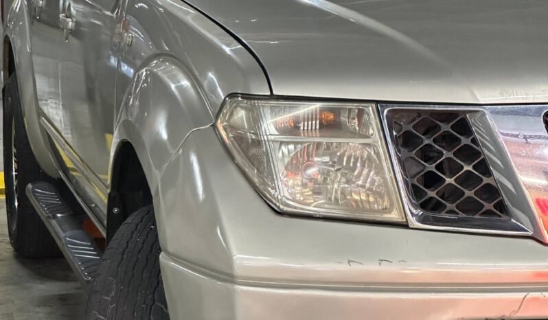 
								NISSAN NAVARA TURBO 4X4 2.5 AT full									