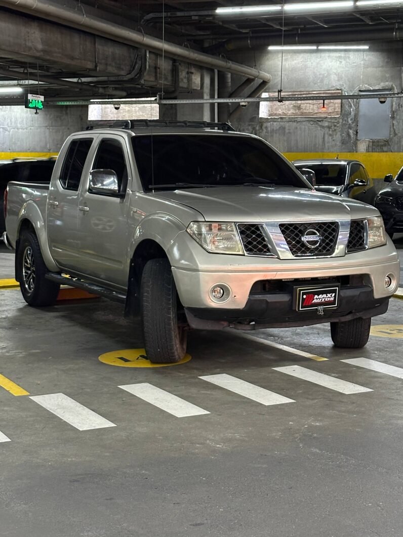 
								NISSAN NAVARA TURBO 4X4 2.5 AT full									