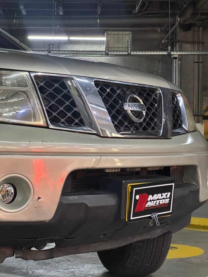 
								NISSAN NAVARA TURBO 4X4 2.5 AT full									