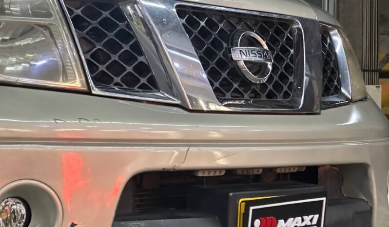 
								NISSAN NAVARA TURBO 4X4 2.5 AT full									