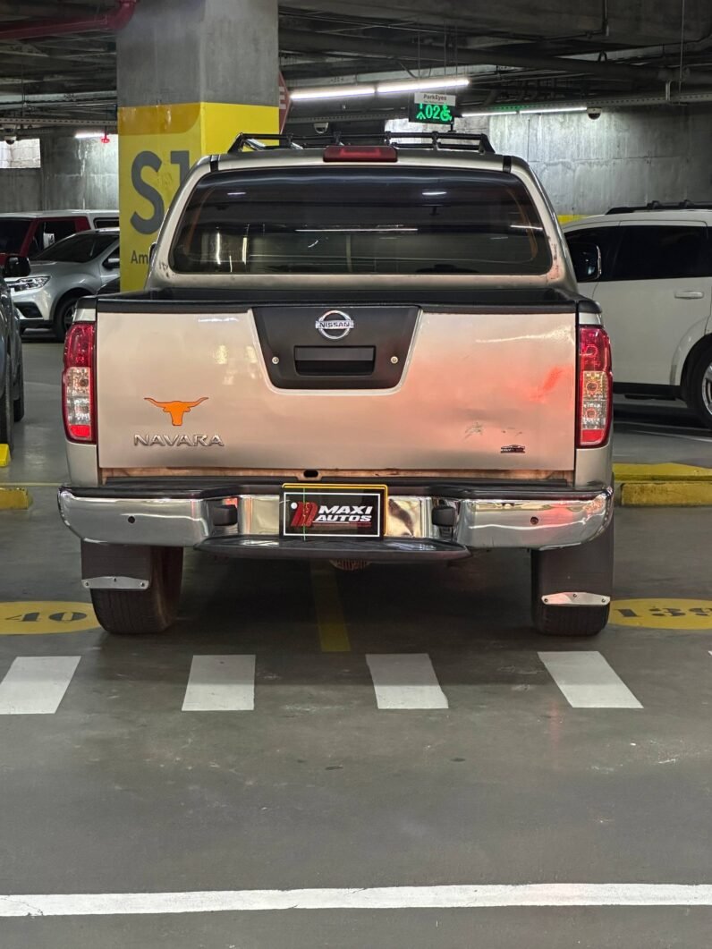 
								NISSAN NAVARA TURBO 4X4 2.5 AT full									