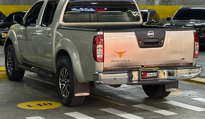 
								NISSAN NAVARA TURBO 4X4 2.5 AT full									