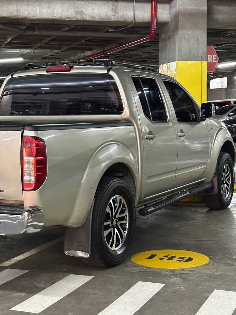 
								NISSAN NAVARA TURBO 4X4 2.5 AT full									