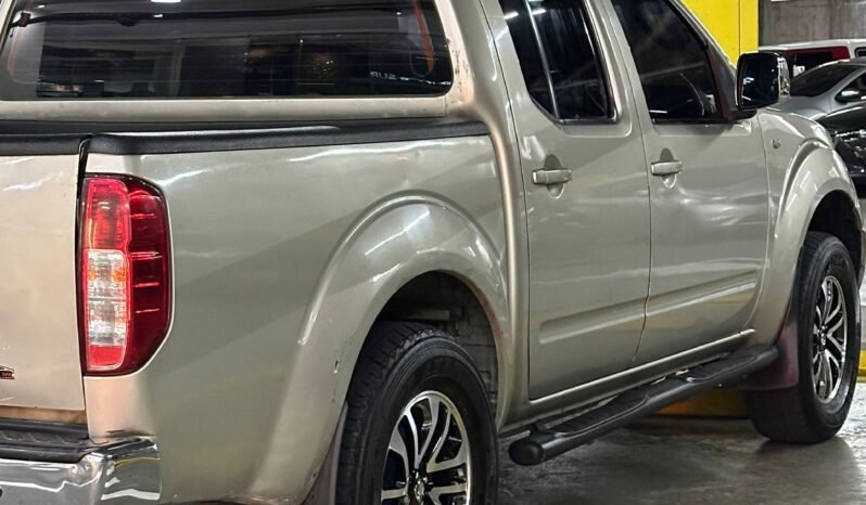 
								NISSAN NAVARA TURBO 4X4 2.5 AT full									
