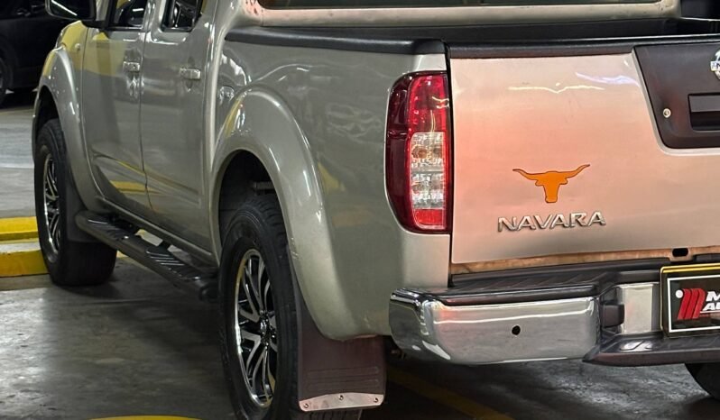 
								NISSAN NAVARA TURBO 4X4 2.5 AT full									