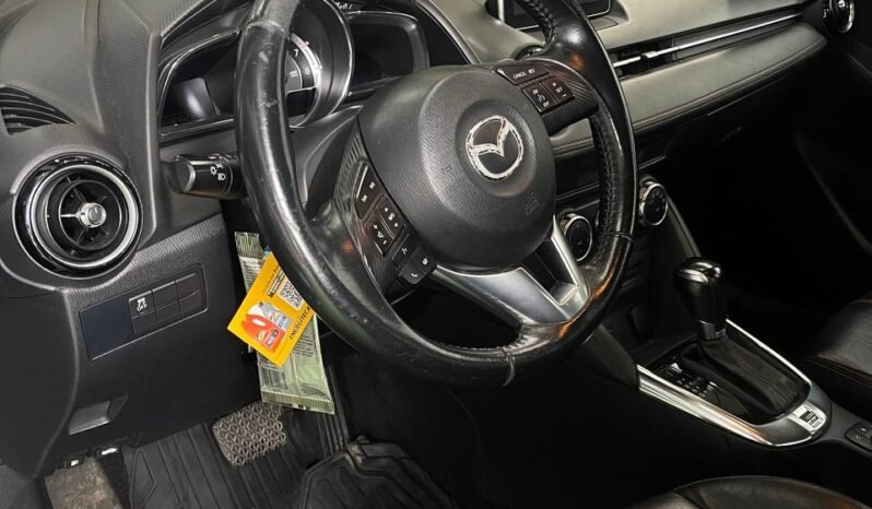 
								MAZDA 2 GRAND TOURING 1.5L AT full									