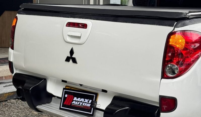 
								MITSUBISHI SPORTERO L200 MT 4X4 DIESEL full									